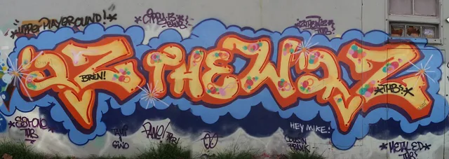 IZ the Wiz mural with broad, colourful letter forms