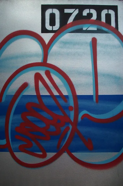 SEEN canvas from 2003: silver-blue bubble forms and a red tag