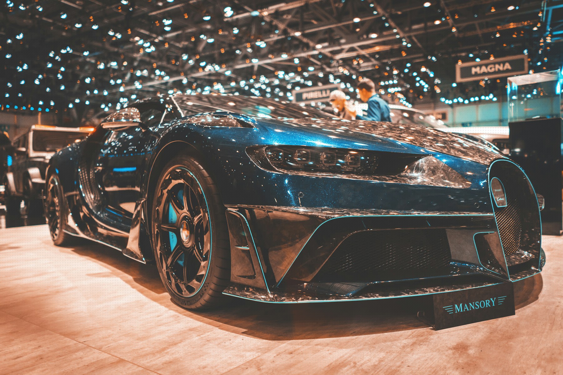 Blue Bugatti Veyron displayed indoors