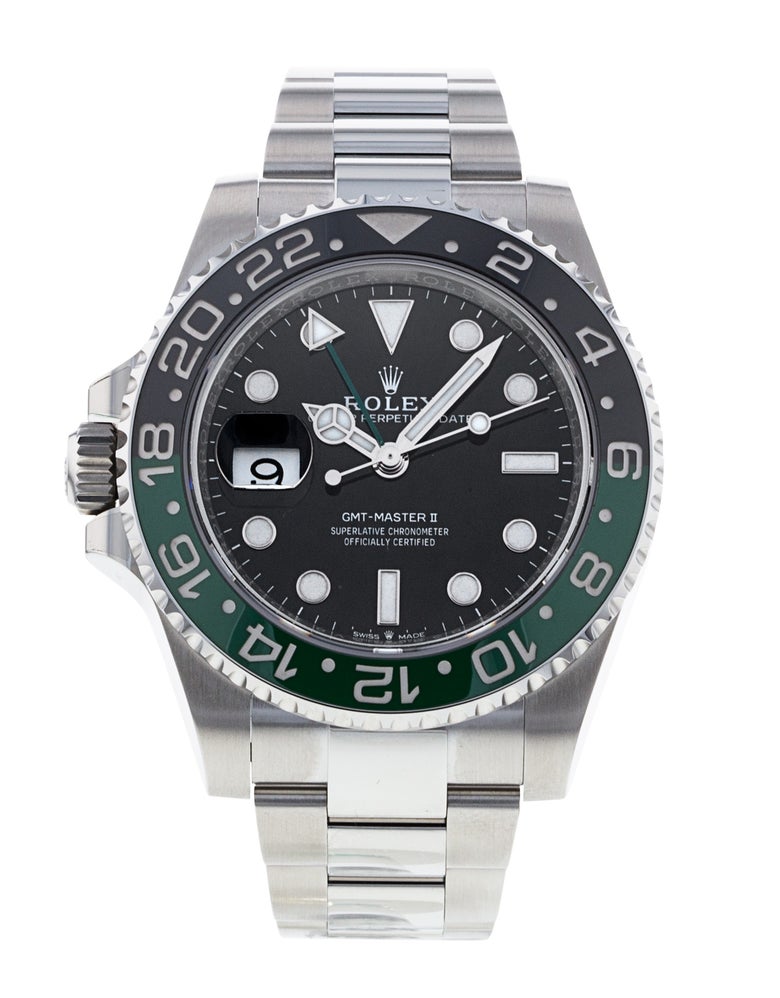 Green and black Rolex GMT-Master II with left-hand crown