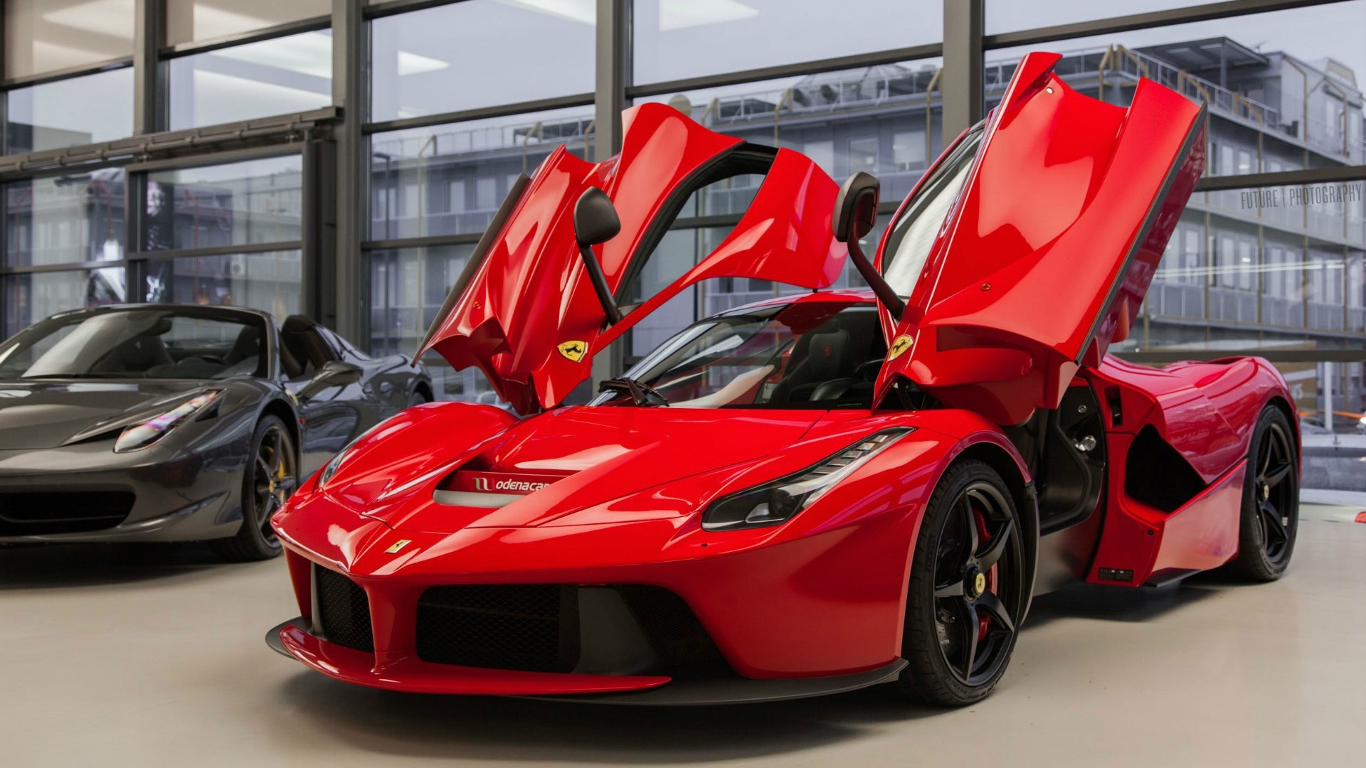 Red Ferrari in a showroom